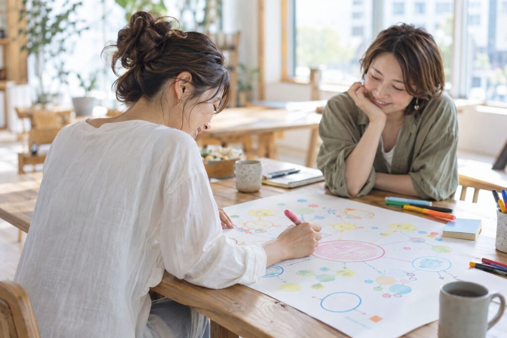 色鮮やかな図を描く2人